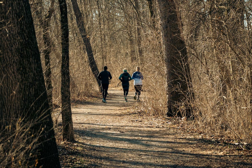 Coach training outdoors as an example of clear profile photography for a coaching website.