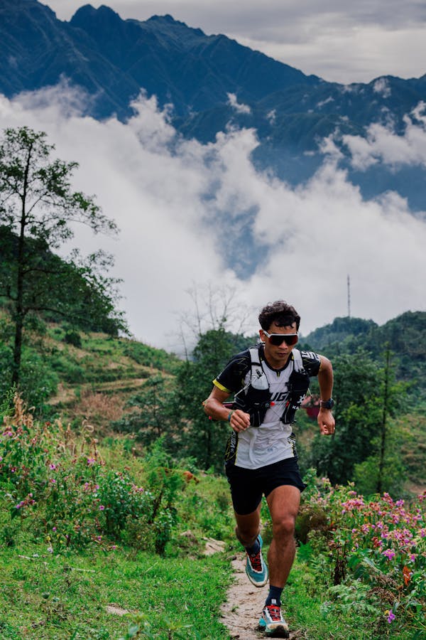 Runner training on a mountain trail.